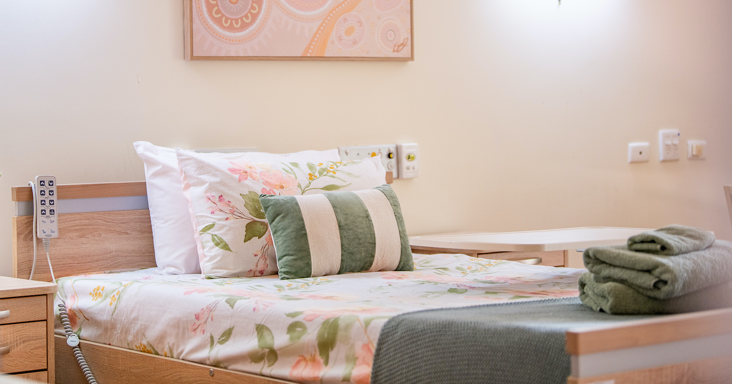 bed with pastel decor